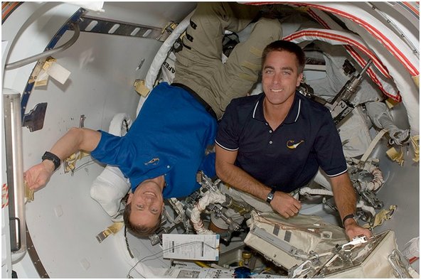 NASA repair technicians doing repair in space