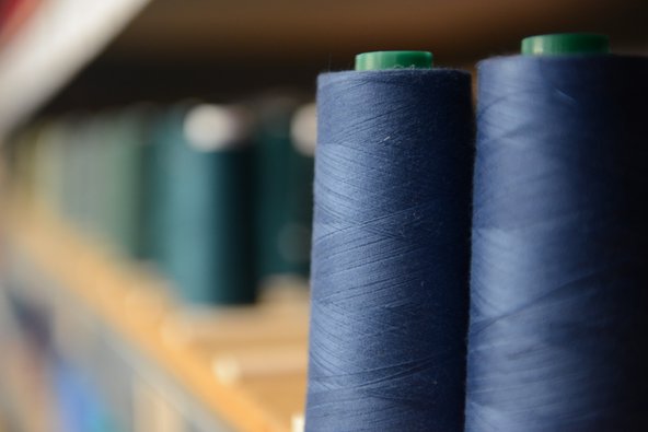 Patagonia common threads on a shelf