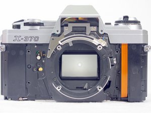 Removing Minolta X-370 Lens Holder