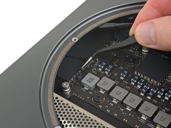 Take care not to pry under the socket, or you may break it off the board.