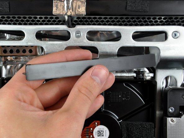 Lift the hard drive bracket straight up off the chassis.