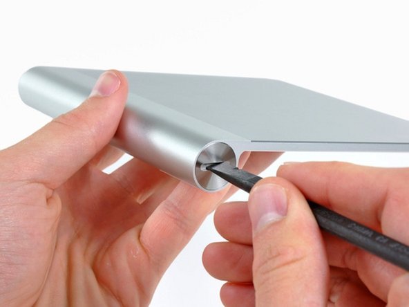 Image 2/3: Remove the batteries to prevent any short-circuiting while fixing your Magic Trackpad.