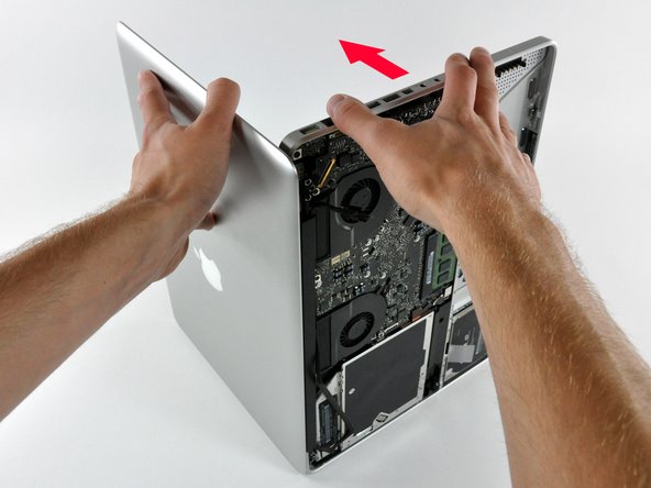 Image 1/3: Rotate the display slightly away from the upper case.