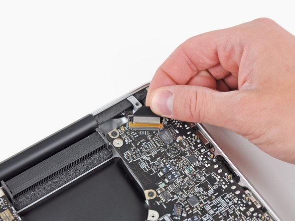 Image 2/3: The display data cable socket is very fragile. '''Do not''' lift the connector upward as you disconnect it, as the socket may break off the logic board. Pull the cable parallel to the face of the logic board.
