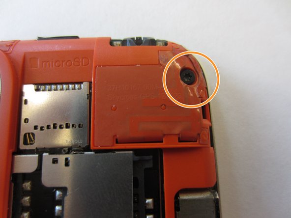 Use a Torx T5 screwdriver to unscrew and remove five 3.0 mm screws from the rear frame.