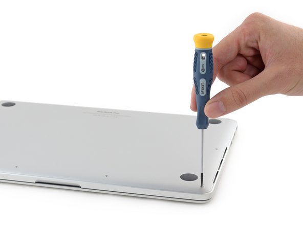 Image 2/2: On the right side, this MacBook is equipped with an SDXC card slot, HDMI port, and a USB 3 port.