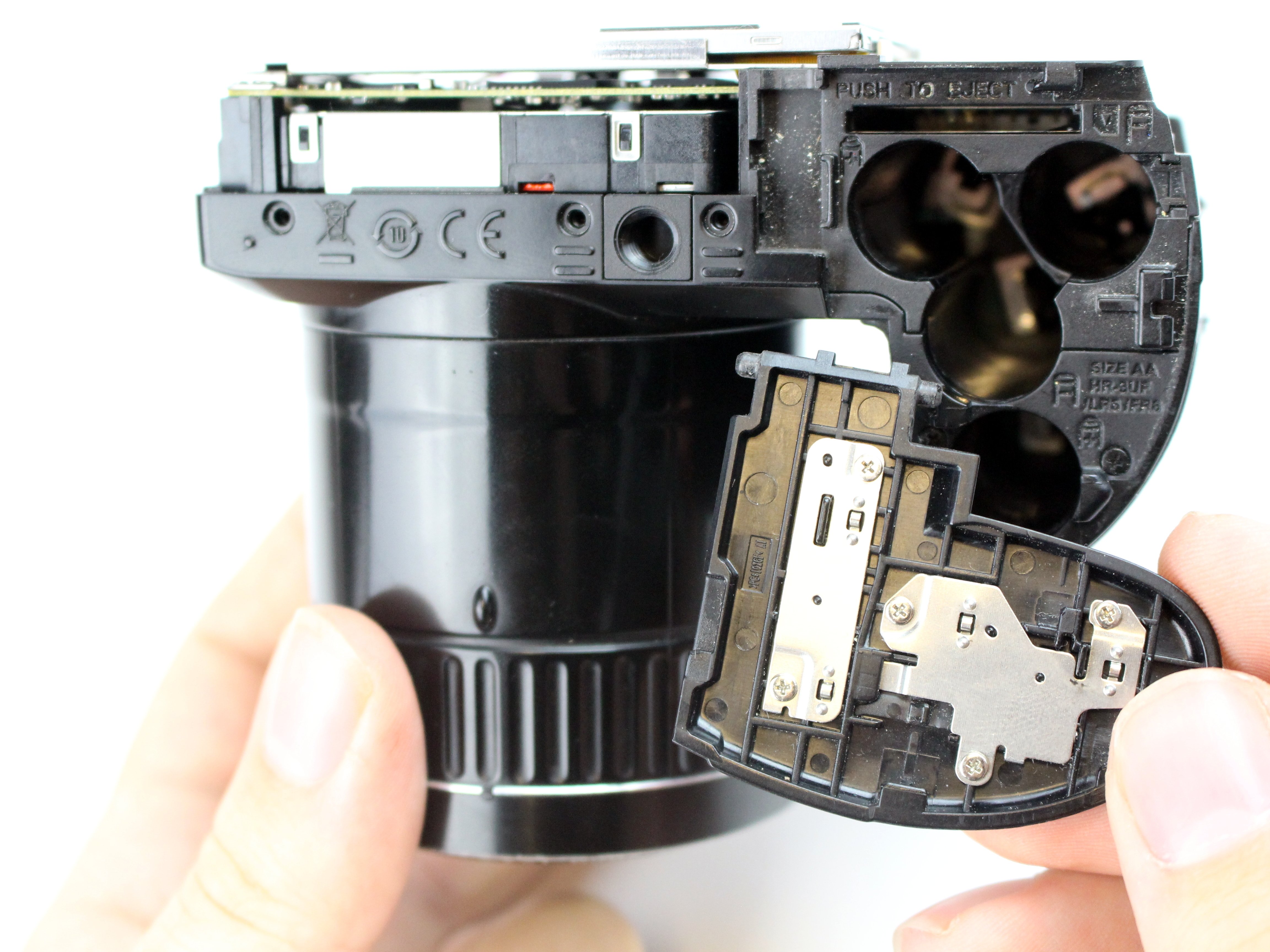 Fujifilm FinePix S4800 Battery Compartment Door Replacement iFixit