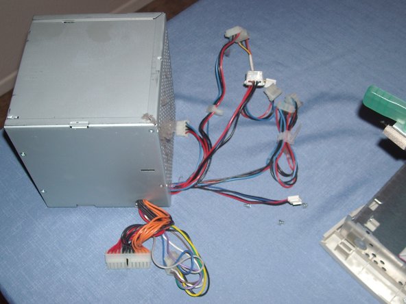 Image 3/3: And pull it out while de-threading the wires.