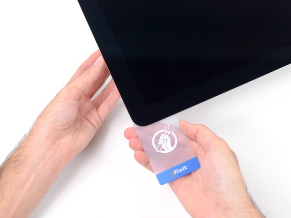 Image 3/3: Be careful '''not''' to insert the plastic card more than 3/8", or you may damage internal components.