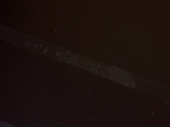 Image 3/3: So, how badly did we break it? Well, upon closer inspection we noticed two very distinct lines running around the perimeter of the display, the inner of which was filled with tiny bubbles.