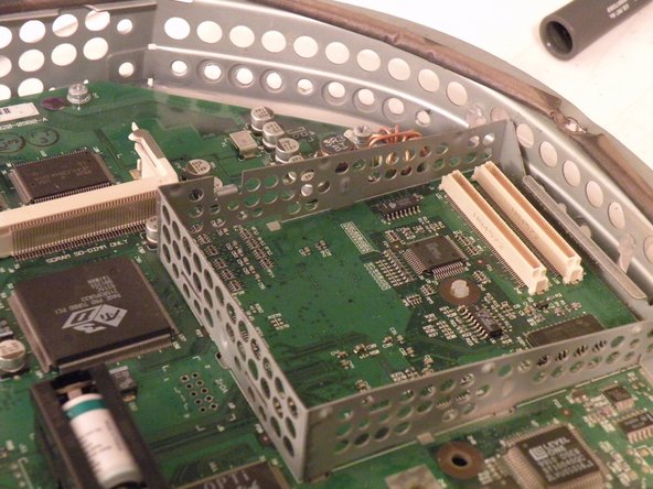 Image 2/3: Lift the card out by this end!