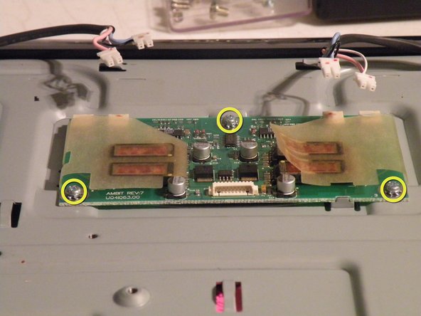 Image 2/3: Remove these 3 phillips screws.