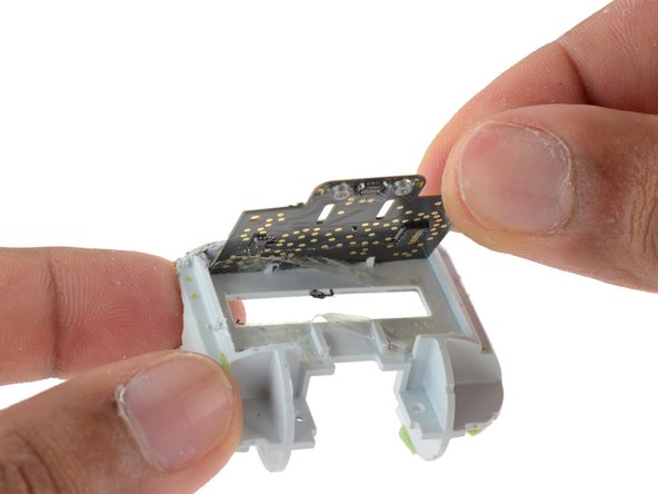 The logic board is secured with a lot of sticky tape.