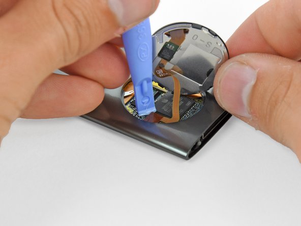 Image 1/2: Remove the click wheel.