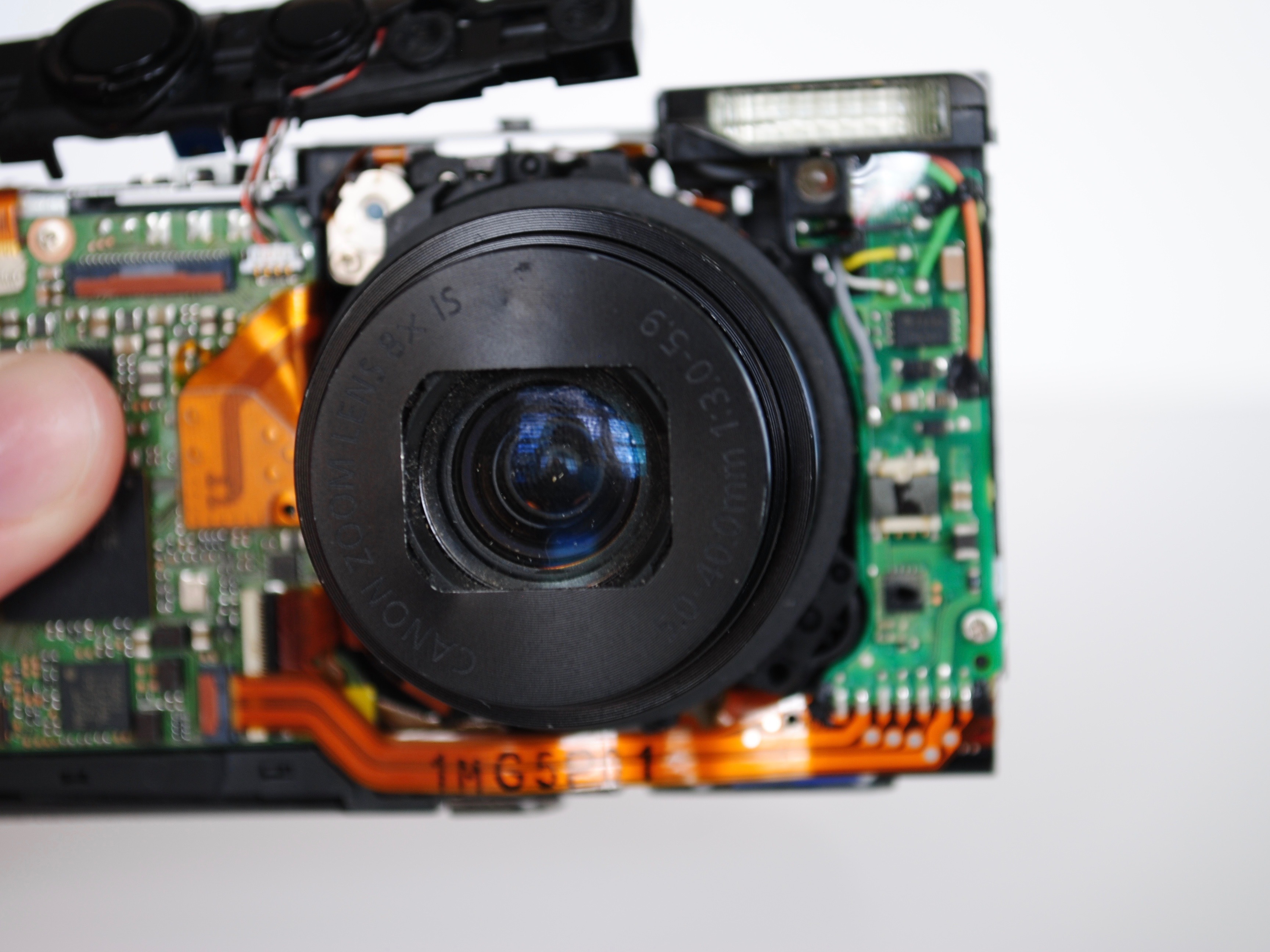 Canon PowerShot ELPH 310 HS Repair - iFixit Lens