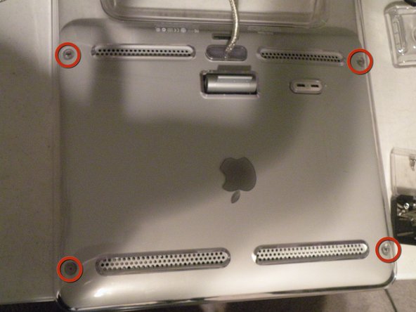 Image 1/3: Then lift the panel from the top of the display.