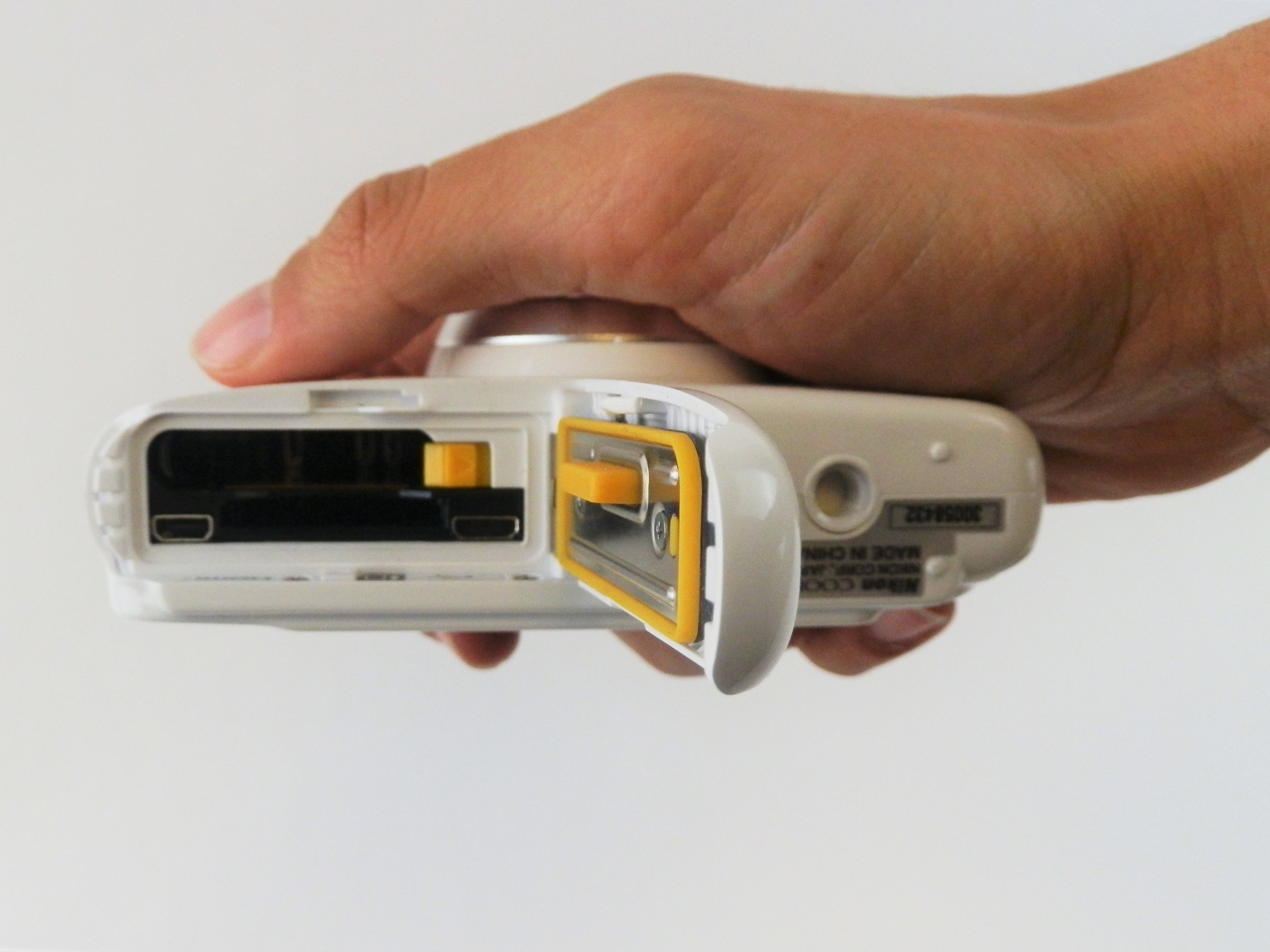 Nikon Coolpix S33 Battery and SD Card Replacement iFixit Repair Guide