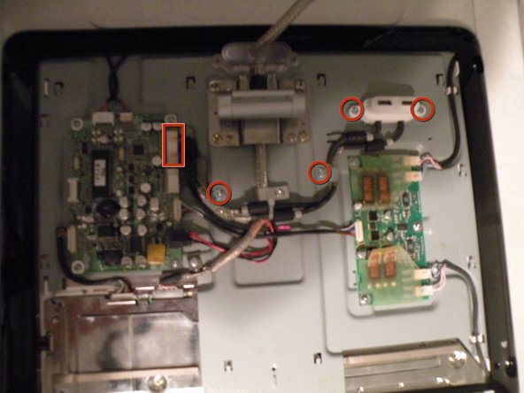 Image 1/1: Remove these 4 phillips screws, and this connector to free the port assembly.