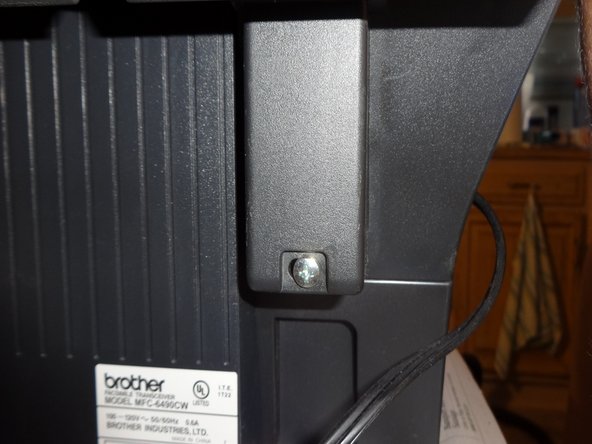 Remove the 2 hinge screws on the back of printer