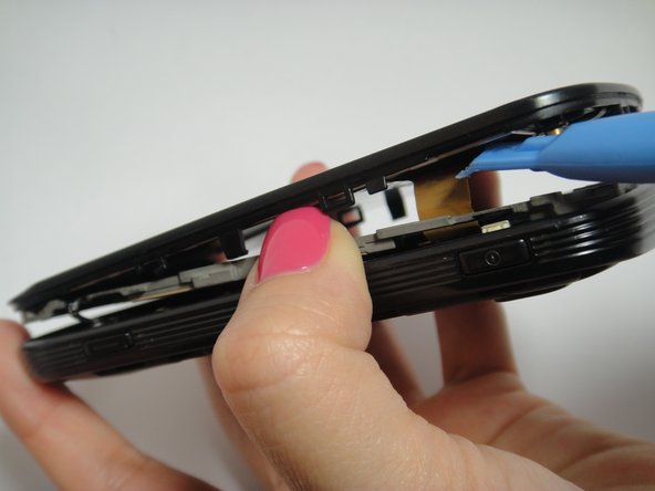Image 2/3: Carefully lift the cover and circle around the rim to open the inside back cover completely.