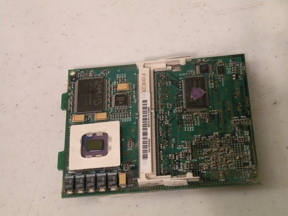 Image 3/3: Lift the card out by this end!