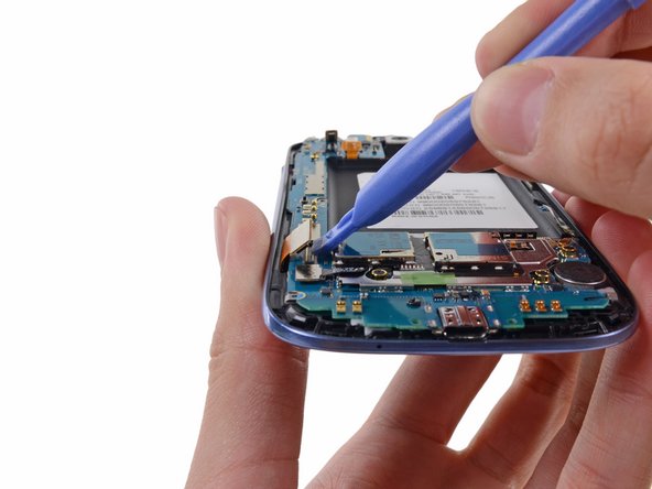 Image 2/2: Disconnect the display data cable from the motherboard.