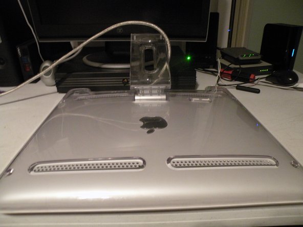 Image 1/3: Remove these 3 hex screws on the swing arm of the display.