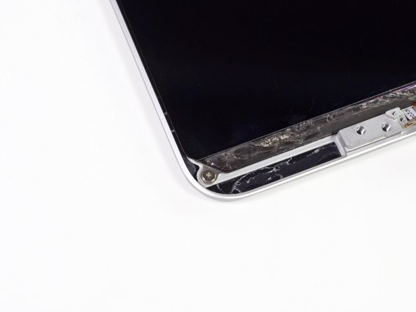 Image 2/3: The 1 mm gap between the aluminum panel and LCD layers might not seem very large, but to dust and debris it's a gaping hole.