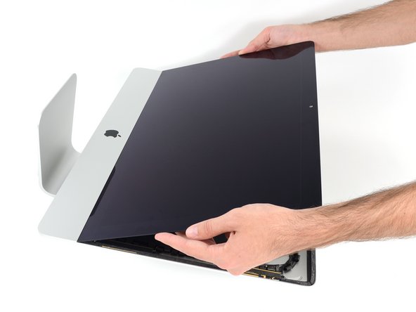 Image 1/3: It may be necessary to slowly lift from one side, to peel against the remaining adhesive.