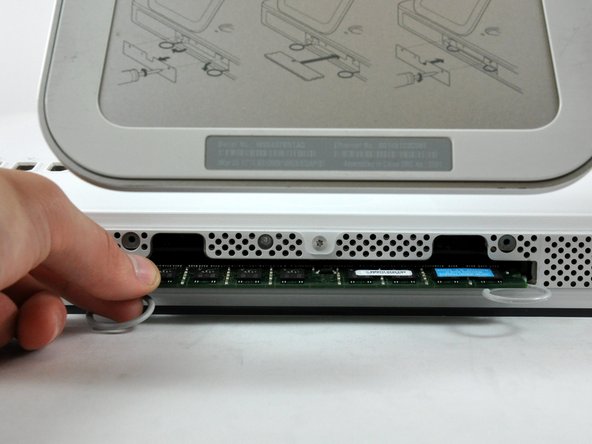 Image 1/1: Make sure both RAM arms are fully rotated outward before reinstalling your RAM chip.