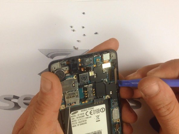 Release the side buttons. The arrow will point you to where they are.