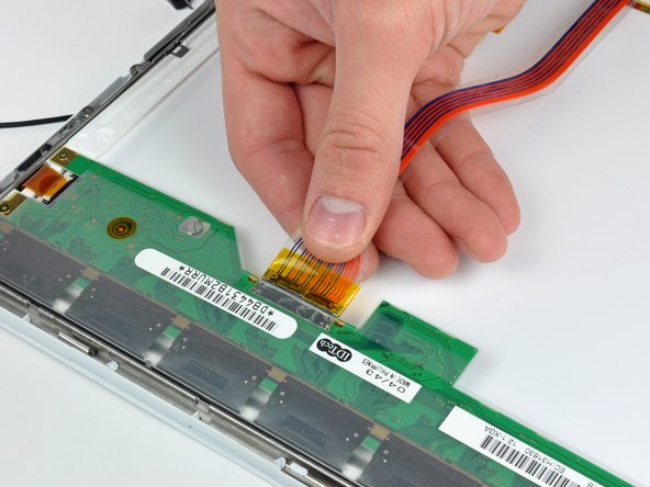 Image 1/2: Pull the connector parallel to the face of the LCD.