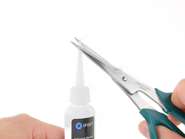 Twist to loosen or remove the bottle cap before you cut the applicator tip.
