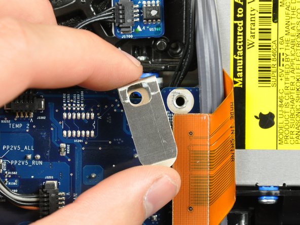 Image 2/2: Remove the flex cable mounting bracket.