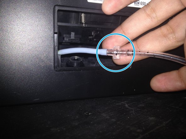 Connect the printer tube to the aquarium tubing you just cut with the connector.