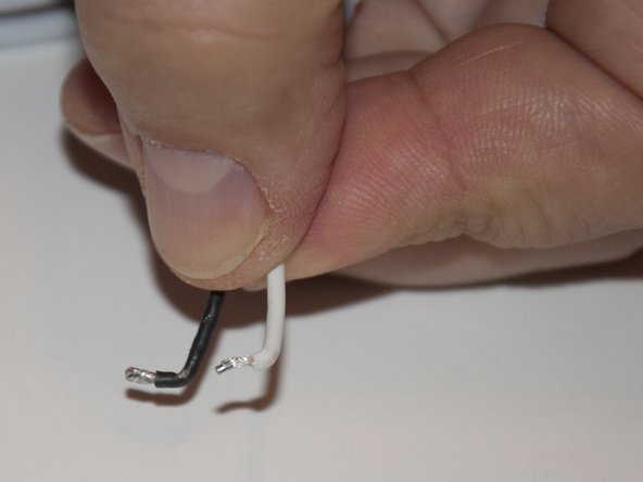 Image 2/2: Bending the wire tips 90 degrees helps with installation.