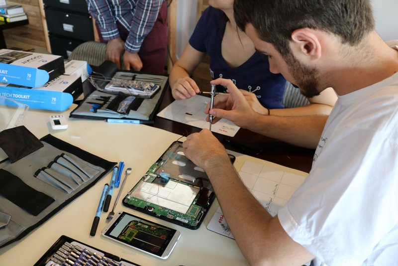 Learning how to take apart and fix tablets