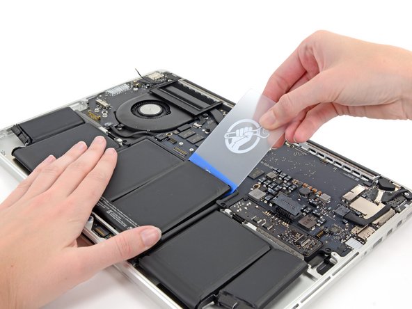 Image 2/3: We launch the rescue effort with our friends, [product|IF145-198-2|iOpener|new_window=true] and [product|IF145-101|plastic card]; after a hearty swig of patience, we set to work.