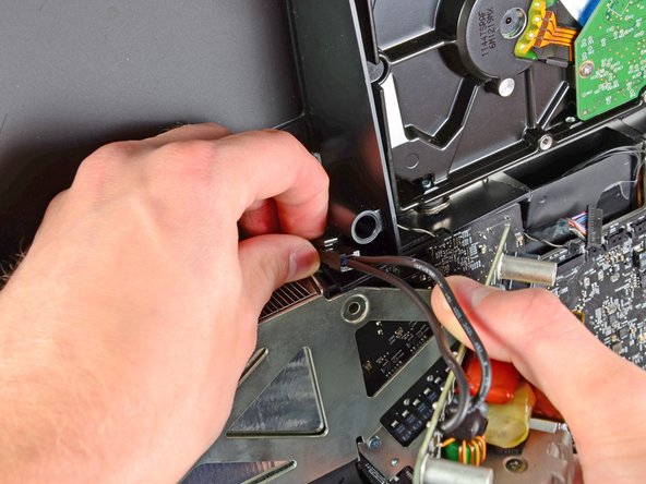 Image 1/1: Remove the power supply from the outer case.