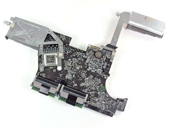 Image 2/2: And, in usual Apple fashion, you have to void the warranty in order to get a peep at the processing power underneath.