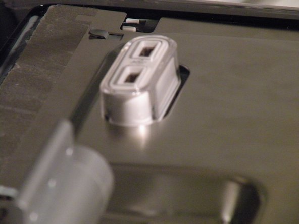 Image 2/3: Also, remove the clear USB port cover.