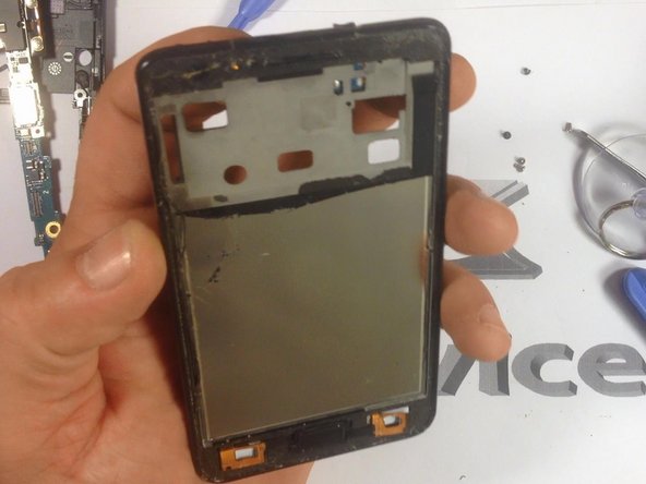 Clean the frame from the remains of tape.