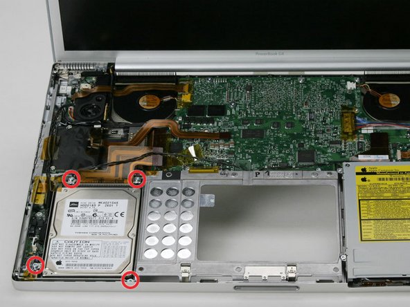 Image 1/1: Make sure you're removing the screws from the hard drive bracket, not the hard drive itself.
