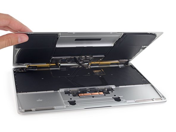 Image 2/3: The standard pop-open-at-the-hinge practice still holds, but then the cables go taut. Then you have to hinge the case back ''forward'' to access the connectors and open the case.