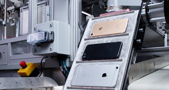 iPhones going through Apple's recycling robot Daisy