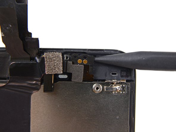 Image 1/2: There is a small, square, plastic and metal holder for the proximity sensor. This holder is essential for the proximity sensor to function correctly.