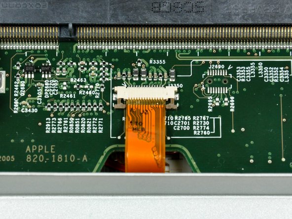 Image 2/2: The ZIF cable lock will move about a millimeter away from the socket before it stops (see picture 2). '''Do not''' try to remove the ZIF cable lock.