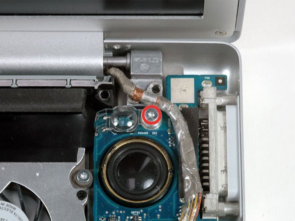 Image 1/1: Lift the clear plastic shield off the right ambient light sensor.