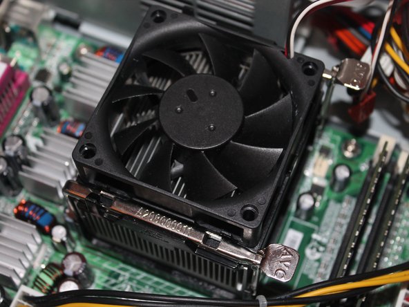 Image 1/3: Now that the computer is cleaned out, it's time to remove the heatsink.