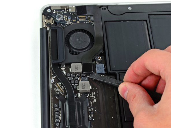 Image 1/2: Be sure to lift straight up on the connector as you disconnect it from its socket. The socket is very deep on the logic board and prying it from side to side may damage the logic board